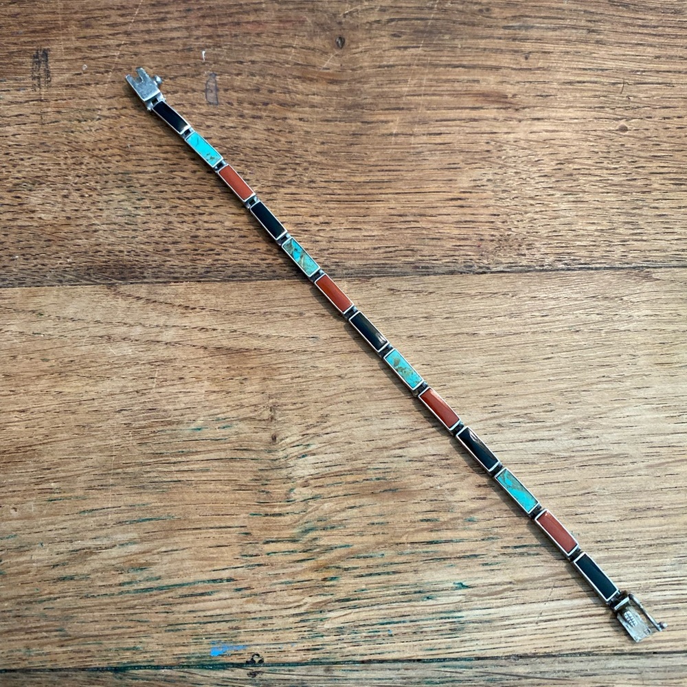 Turquoise, onyx, coral and sterling silver bracelet